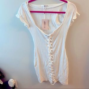 White Bodycon Lace-Up Front Mini Dress. NWT size 4.